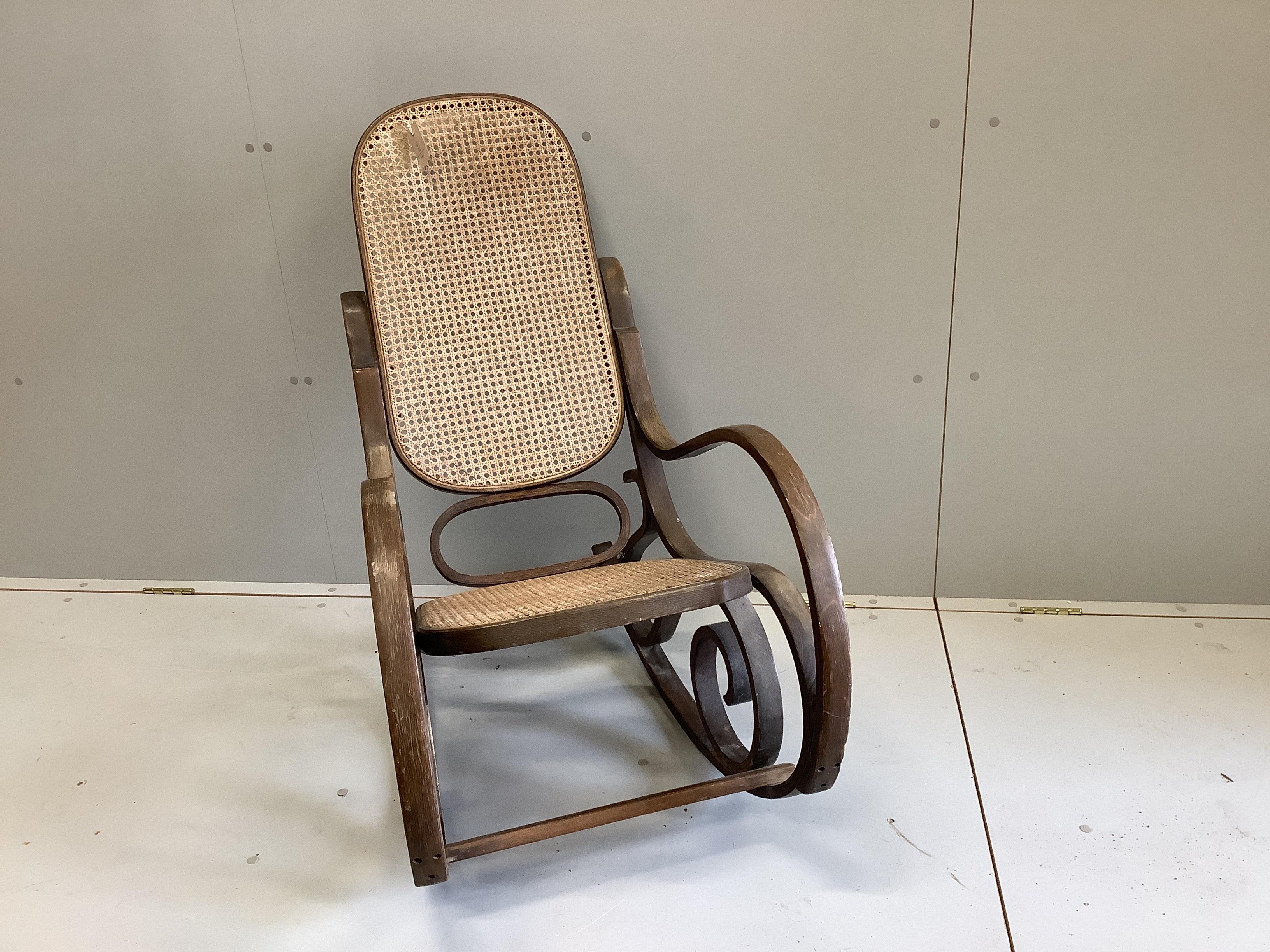 A caned beech bentwood rocking chair, width 49cm, depth 72cm, height 108cm